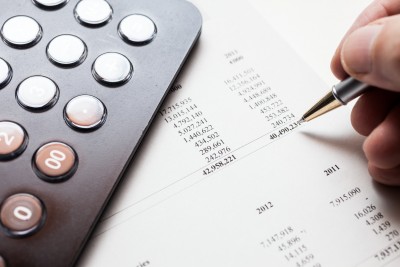 Accountant checking numbers on a document
