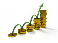 business graph with arrow and coins showing profits and gains